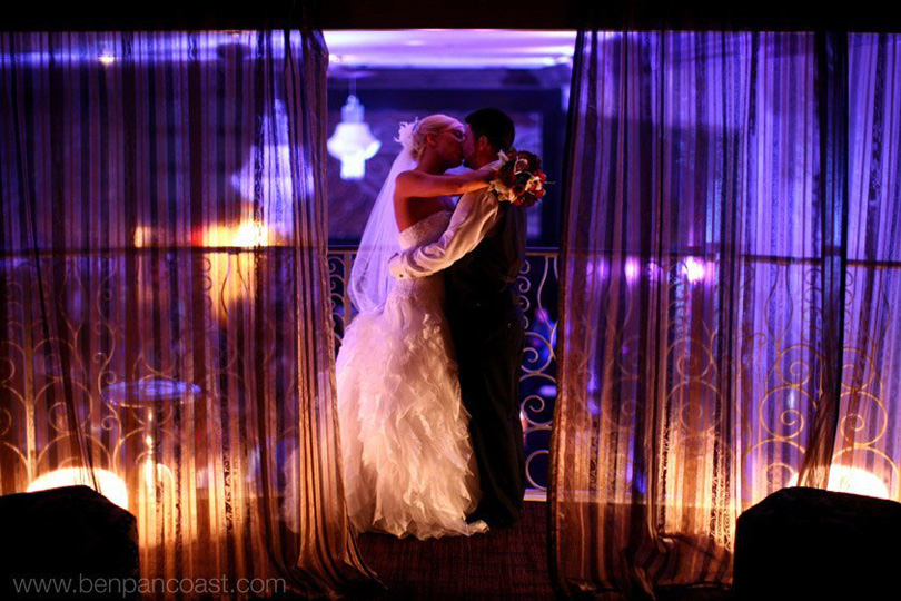 Image of bride groom balcony kiss in The Allure Wedding Venue and Event Center in LaPorte, Indiana