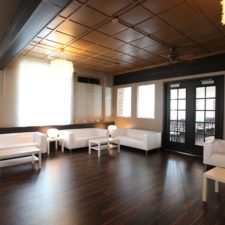 Image of downstairs lounge space at The Allure Wedding Venue and Event Center in LaPorte, IN where guests can enjoy cocktail hour space