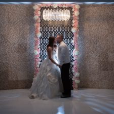 Image of bride and groom intimate kiss in the beautiful ceremony site of one of the most luxurious wedding venues in Chicago and Northwest Indiana